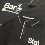 polo nera team strisce argento fronte retro